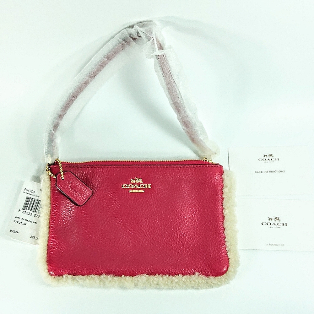 Coach new cranberry pink leather sherppa trim wristlet wallet NWT